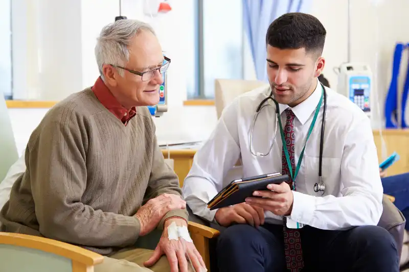 Medical professional holding an instrument for Skin Cancer